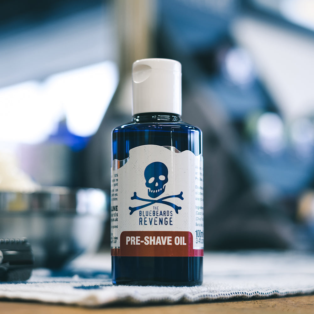 The Bluebeards Revenge vegan friendly Pre-Shave Oil sitting alongside traditional wet shaving products
